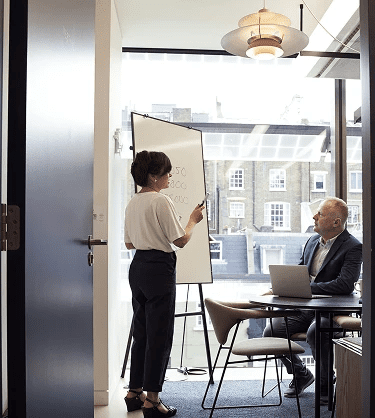 Image of two people on business meeting